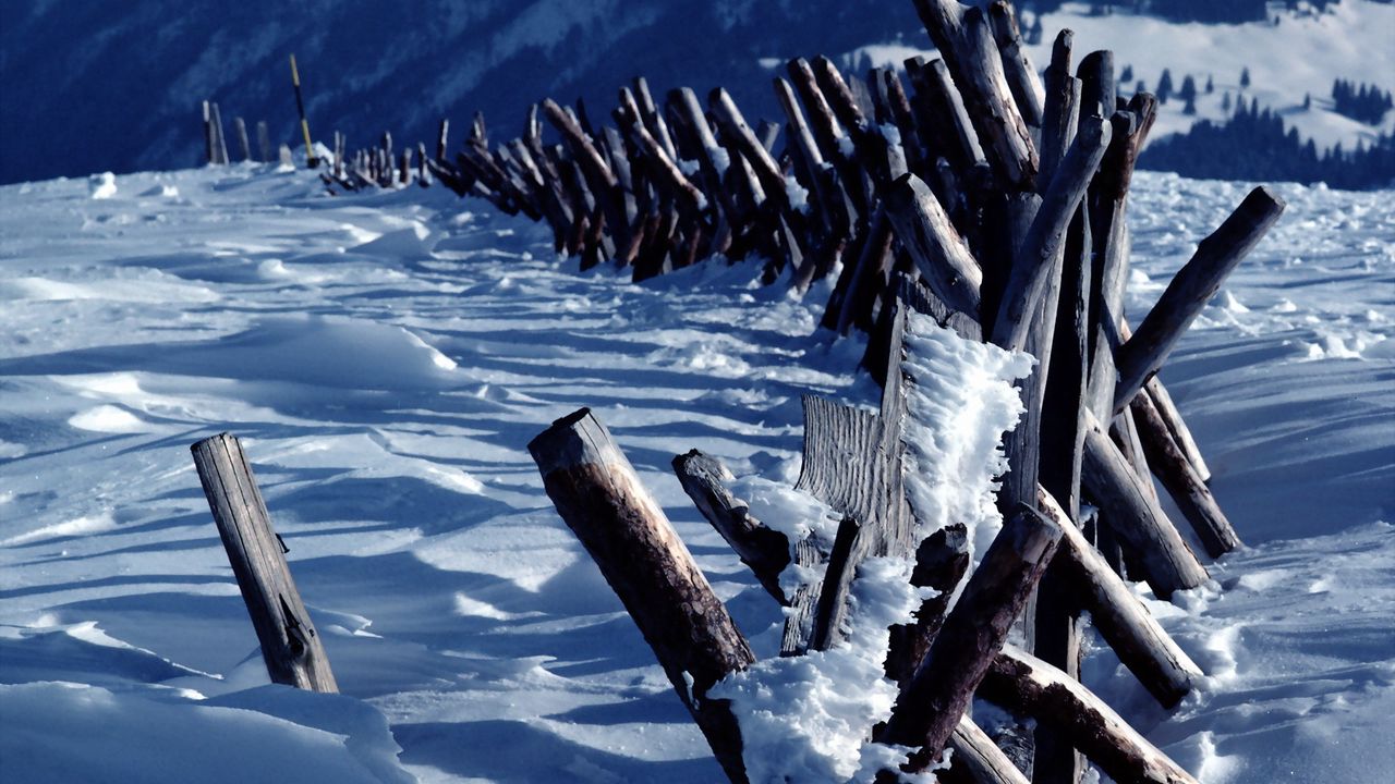 Wallpaper fence, logs, mountains, snow