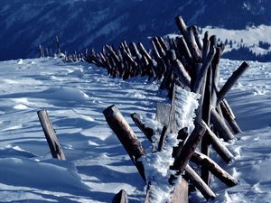 Preview wallpaper fence, logs, mountains, snow