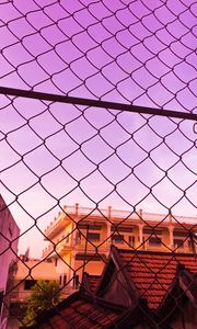 Preview wallpaper fence, mesh, building, sky, pink