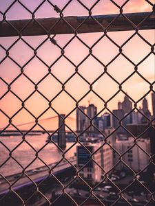 Preview wallpaper fence, mesh, city, blur