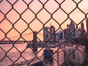 Preview wallpaper fence, mesh, city, blur