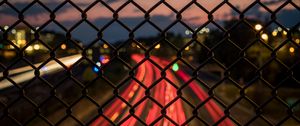 Preview wallpaper fence, mesh, lowlight, night, street