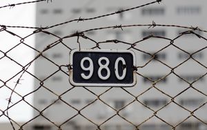 Preview wallpaper fence, mesh, numerals, barbed wire