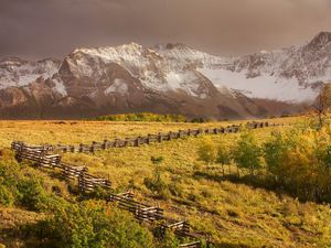 Preview wallpaper fence, protection, zigzags, mountains, autumn, trees