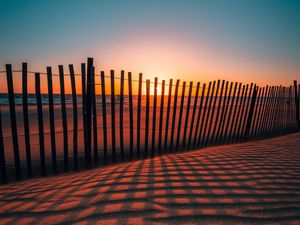 Preview wallpaper fence, shadow, sunset, sand