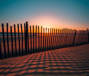 Preview wallpaper fence, shadow, sunset, sand