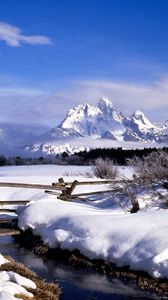 Preview wallpaper fence, snow, winter, stream, mountains, fog