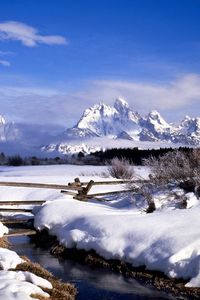 Preview wallpaper fence, snow, winter, stream, mountains, fog