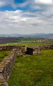 Preview wallpaper fence, stones, grass, field, valley