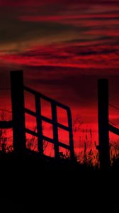 Preview wallpaper fence, sunset, evening, silhouettes, grass