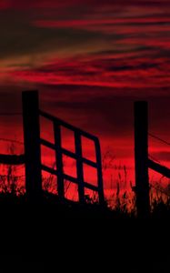 Preview wallpaper fence, sunset, evening, silhouettes, grass