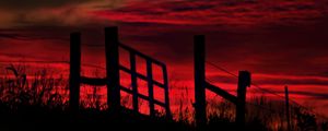 Preview wallpaper fence, sunset, evening, silhouettes, grass