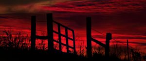 Preview wallpaper fence, sunset, evening, silhouettes, grass