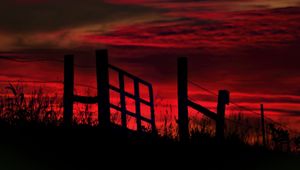 Preview wallpaper fence, sunset, evening, silhouettes, grass