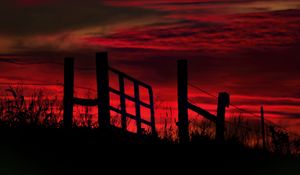Preview wallpaper fence, sunset, evening, silhouettes, grass