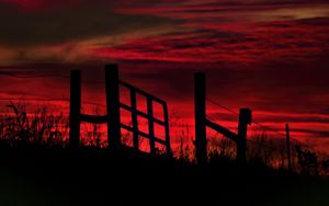 Preview wallpaper fence, sunset, evening, silhouettes, grass