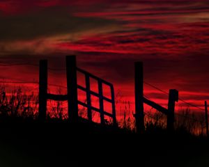 Preview wallpaper fence, sunset, evening, silhouettes, grass