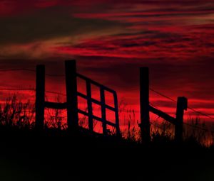 Preview wallpaper fence, sunset, evening, silhouettes, grass