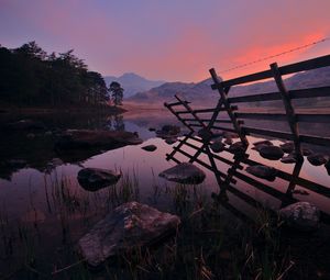 Preview wallpaper fence, water, stones, morning, mountains, wood