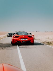 Preview wallpaper ferrari 458, ferrari, red, sports car, rear view, road, movement