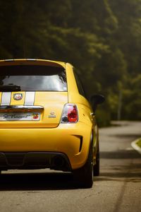 Preview wallpaper ferrari 695, ferrari, car, yellow, rear view, road