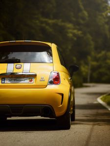 Preview wallpaper ferrari 695, ferrari, car, yellow, rear view, road