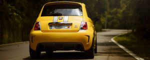 Preview wallpaper ferrari 695, ferrari, car, yellow, rear view, road