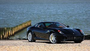 Preview wallpaper ferrari, black, front view, beach