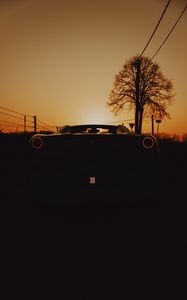 Preview wallpaper ferrari, car, dark, rear view