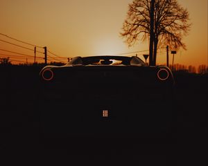 Preview wallpaper ferrari, car, dark, rear view