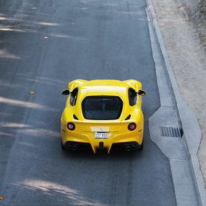 Preview wallpaper ferrari, car, sports car, yellow, aerial view