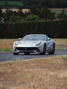 Preview wallpaper ferrari, sports car, car, front view, road