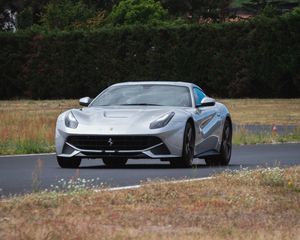 Preview wallpaper ferrari, sports car, car, front view, road