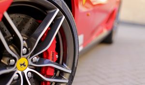 Preview wallpaper ferrari, tire, wheel, logo