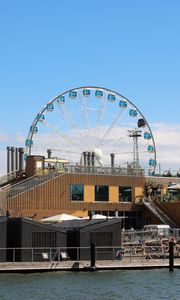 Preview wallpaper ferris wheel, attraction, building, water