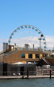 Preview wallpaper ferris wheel, attraction, building, water