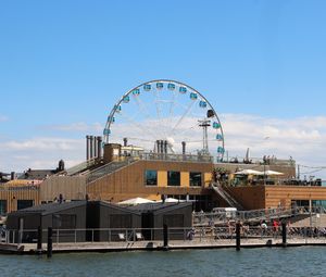 Preview wallpaper ferris wheel, attraction, building, water