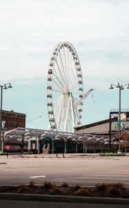 Preview wallpaper ferris wheel, attraction, buildings, parking
