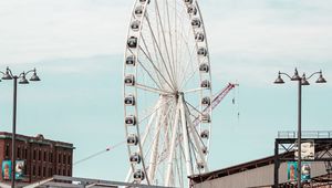 Preview wallpaper ferris wheel, attraction, buildings, parking