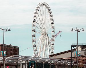 Preview wallpaper ferris wheel, attraction, buildings, parking