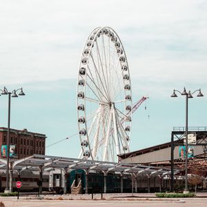 Preview wallpaper ferris wheel, attraction, buildings, parking