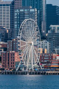 Preview wallpaper ferris wheel, attraction, buildings, water