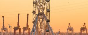 Preview wallpaper ferris wheel, attraction, city, port, sunset