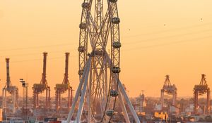 Preview wallpaper ferris wheel, attraction, city, port, sunset