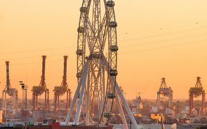 Preview wallpaper ferris wheel, attraction, city, port, sunset