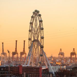 Preview wallpaper ferris wheel, attraction, city, port, sunset