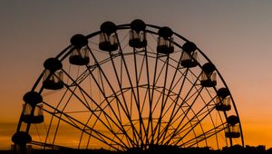 Preview wallpaper ferris wheel, attraction, silhouette, evening, sunset