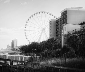 Preview wallpaper ferris wheel, attraction, sky, trees, buildings, bw