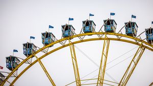 Preview wallpaper ferris wheel, attraction, sky, flags