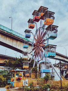 Preview wallpaper ferris wheel, bridge, fence, multicolored